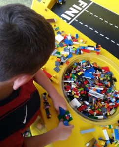 A child playing with LEGOS