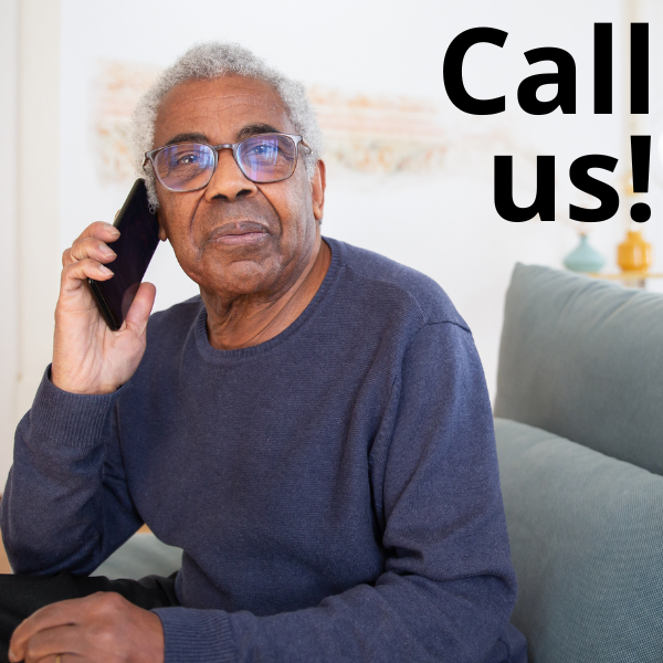 Call us! A gray haired person on the phone