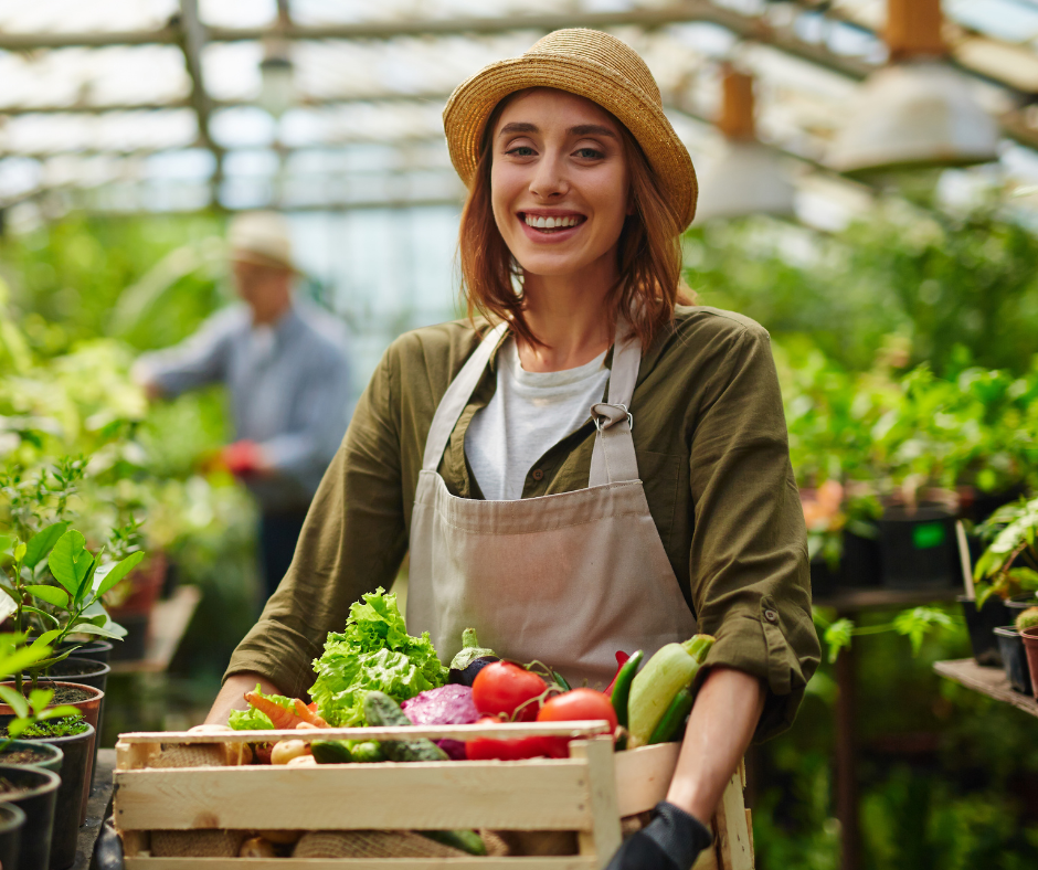 Summer Reading Gardener Woman in hat holding box of produce