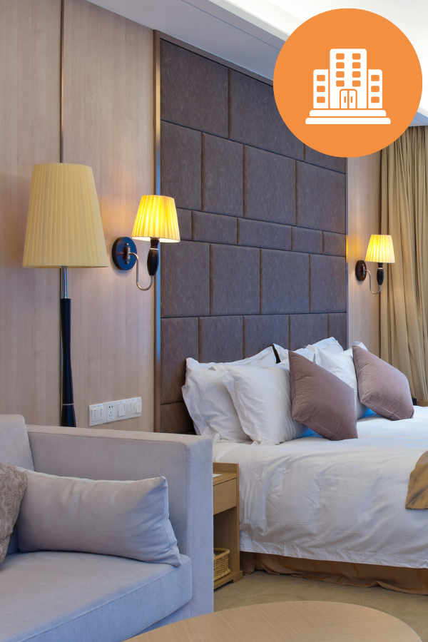 Hotel hotel room with lights and bed