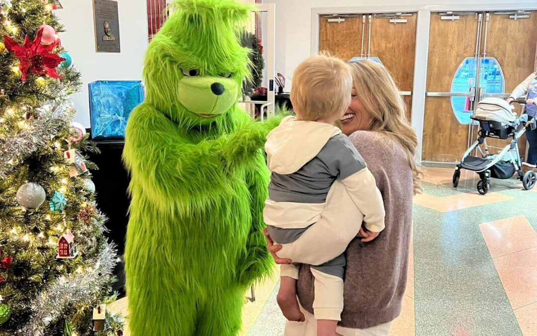 The grinch meeting a mother and baby