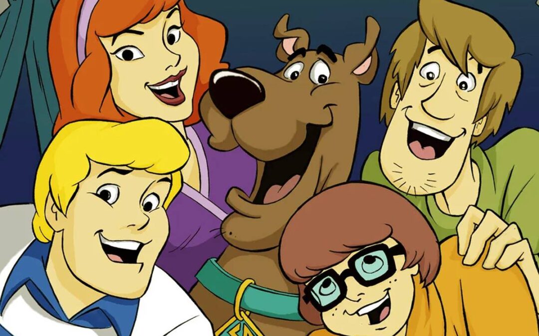 Scooby Doo, Shaggy, Velma, Fred, and Daphne smiling