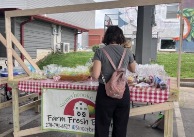 Shopper at a vendor booth