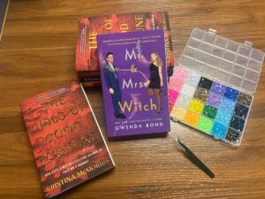 Book covers in the process of bedazzling